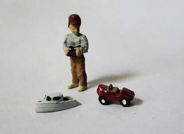 Arttista 1558 O Boy with Radio-Controlled Car & Boat Pewter Figure Hand Painted
