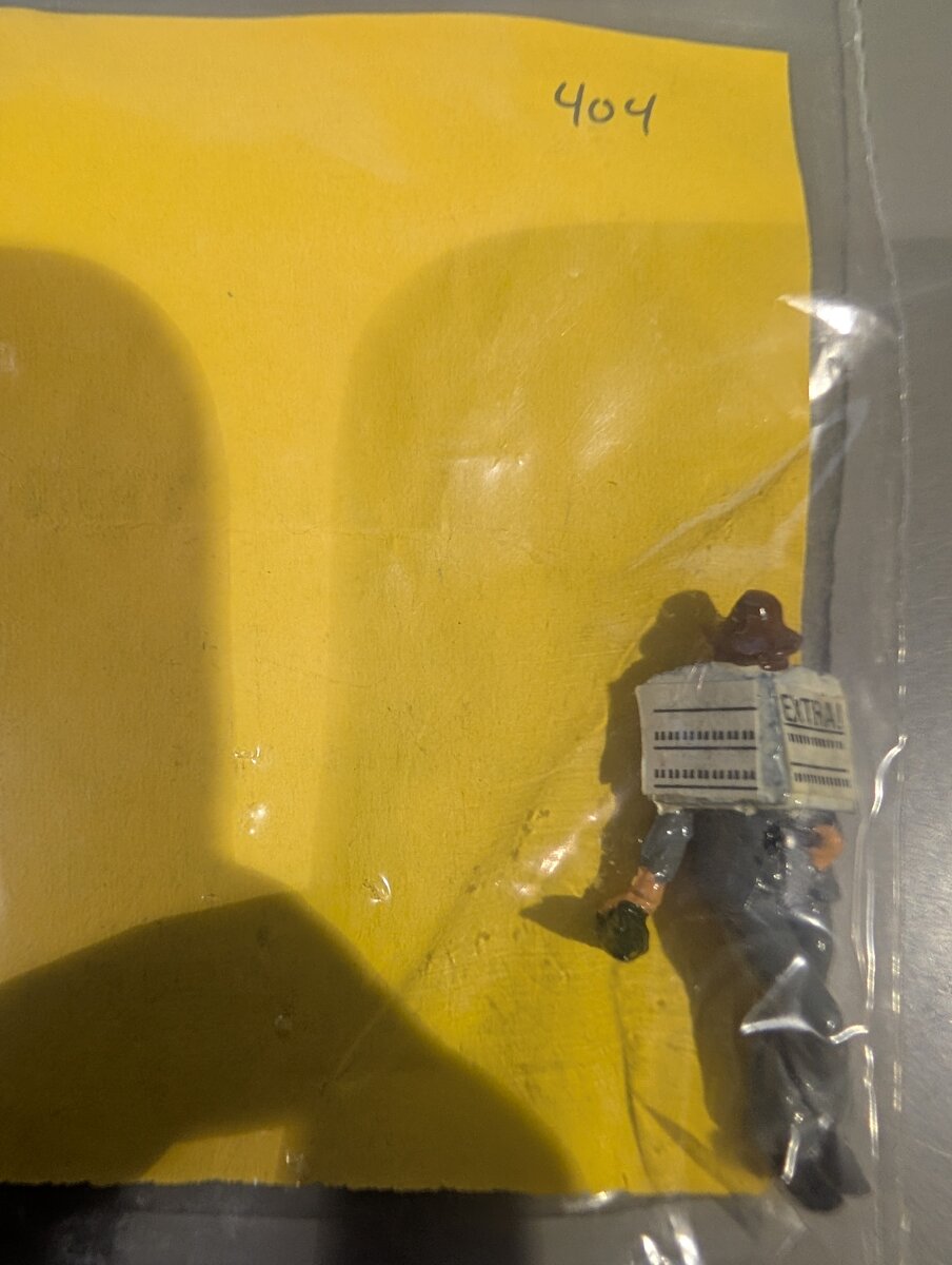 The Railmen Company 404 O Scale Man Sleeping w/Newspaper & Bottle Figure