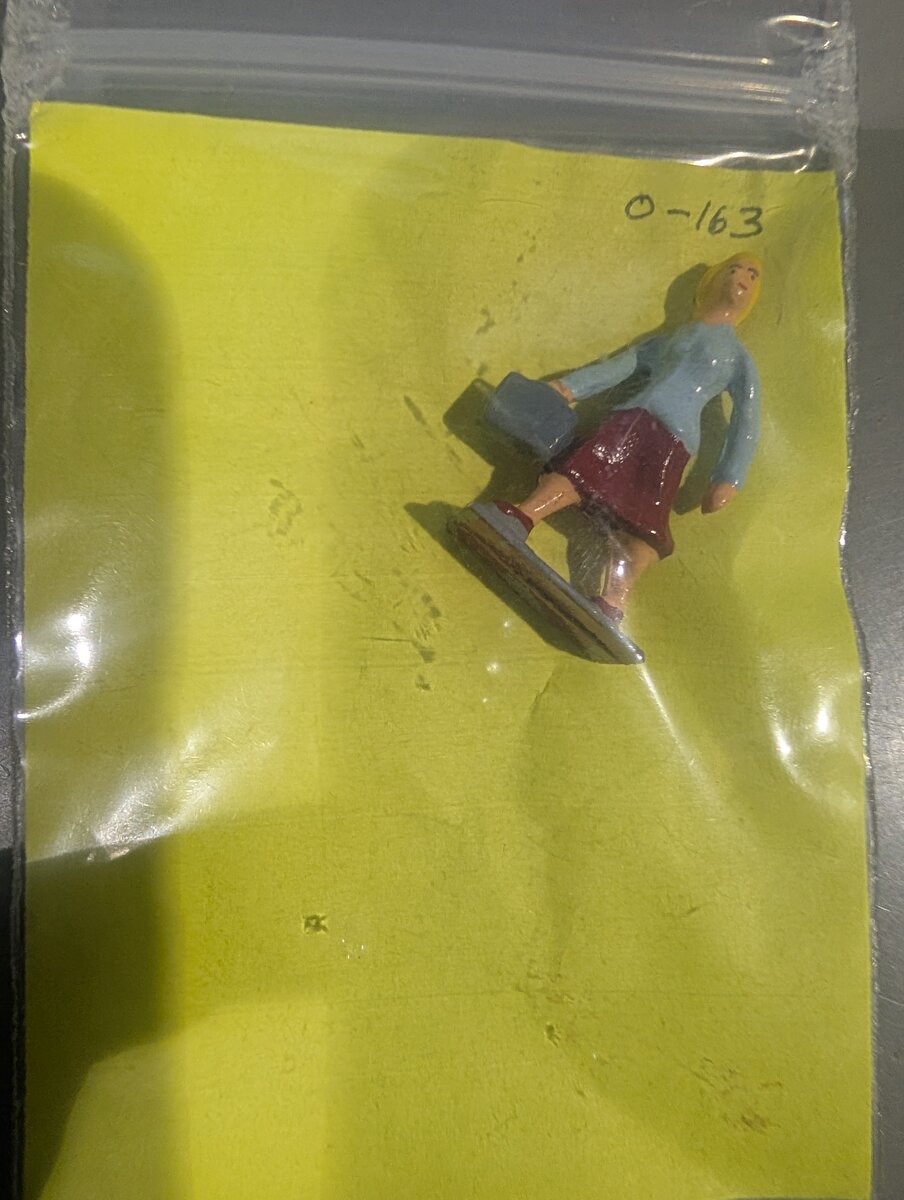 The Railmen Company 163 O Scale Woman Carrying Suitcase Figure
