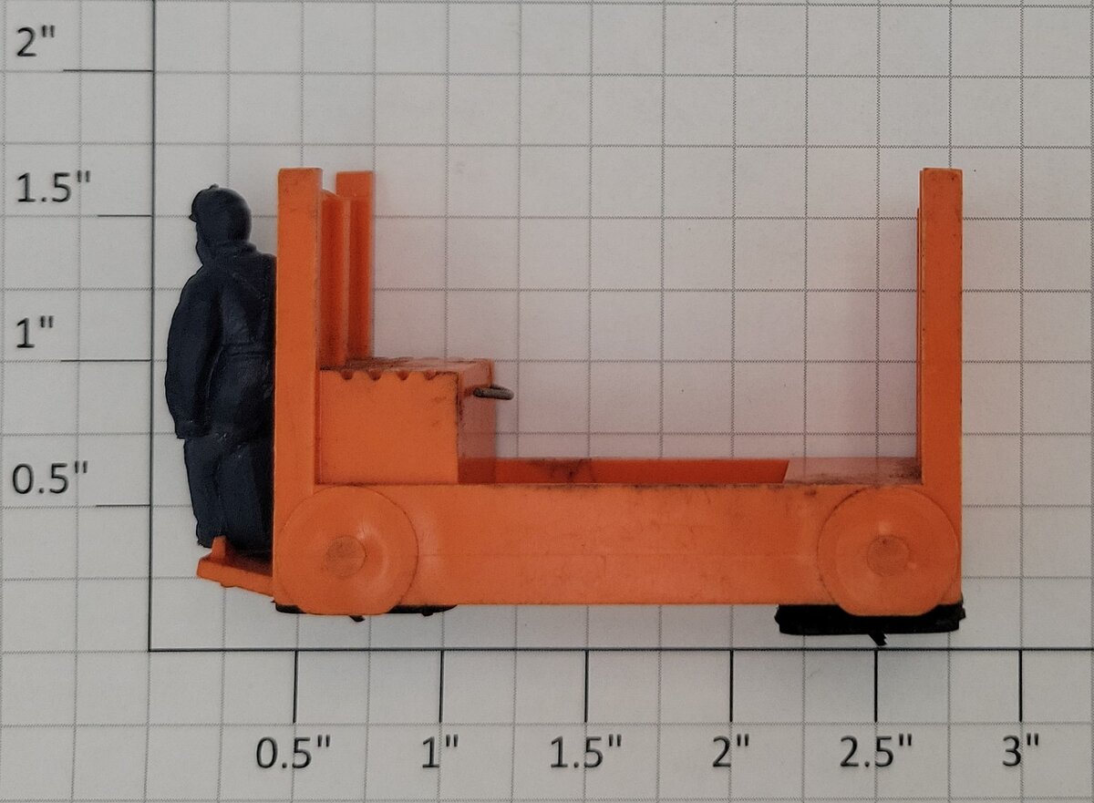 Lionel 356-35 O Gauge Orange Baggage Cart with Unpainted Figure - Minor Damage