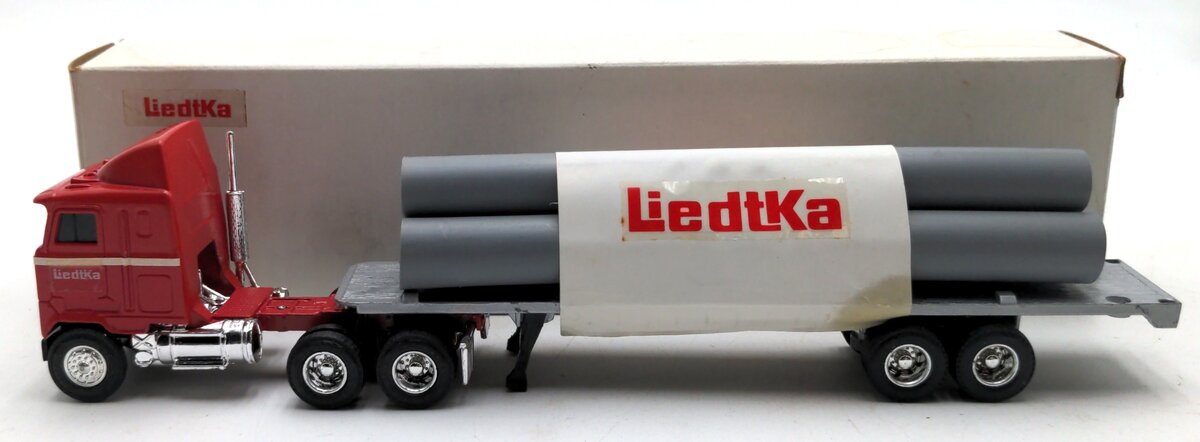 Winross WIN98 1:64 Diecast Liedtka Trucking Kenworth COE w/Pipe Load