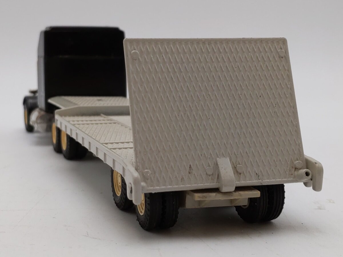 Joal 1:50 Scale Peterbilt Black 3-Axle Tractor w/Sleeper & Ramp Trailer LN