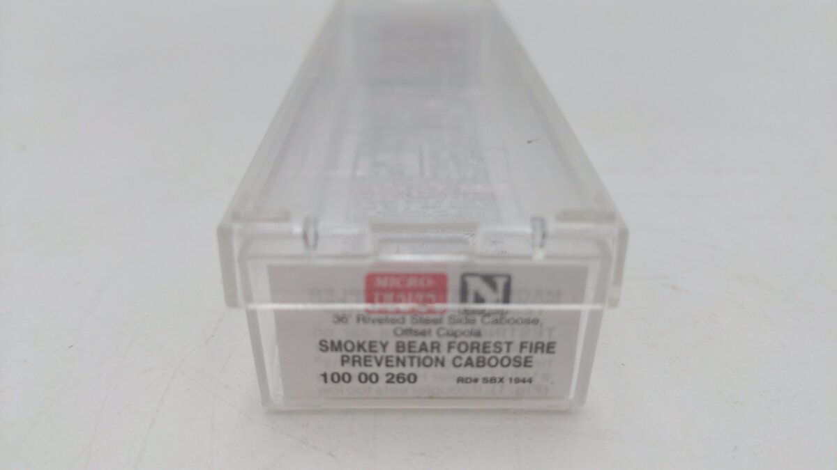 Micro-Trains 10000260 N Smokey Bear '36 Riveted Steel Side Caboose #1944 LN/Box