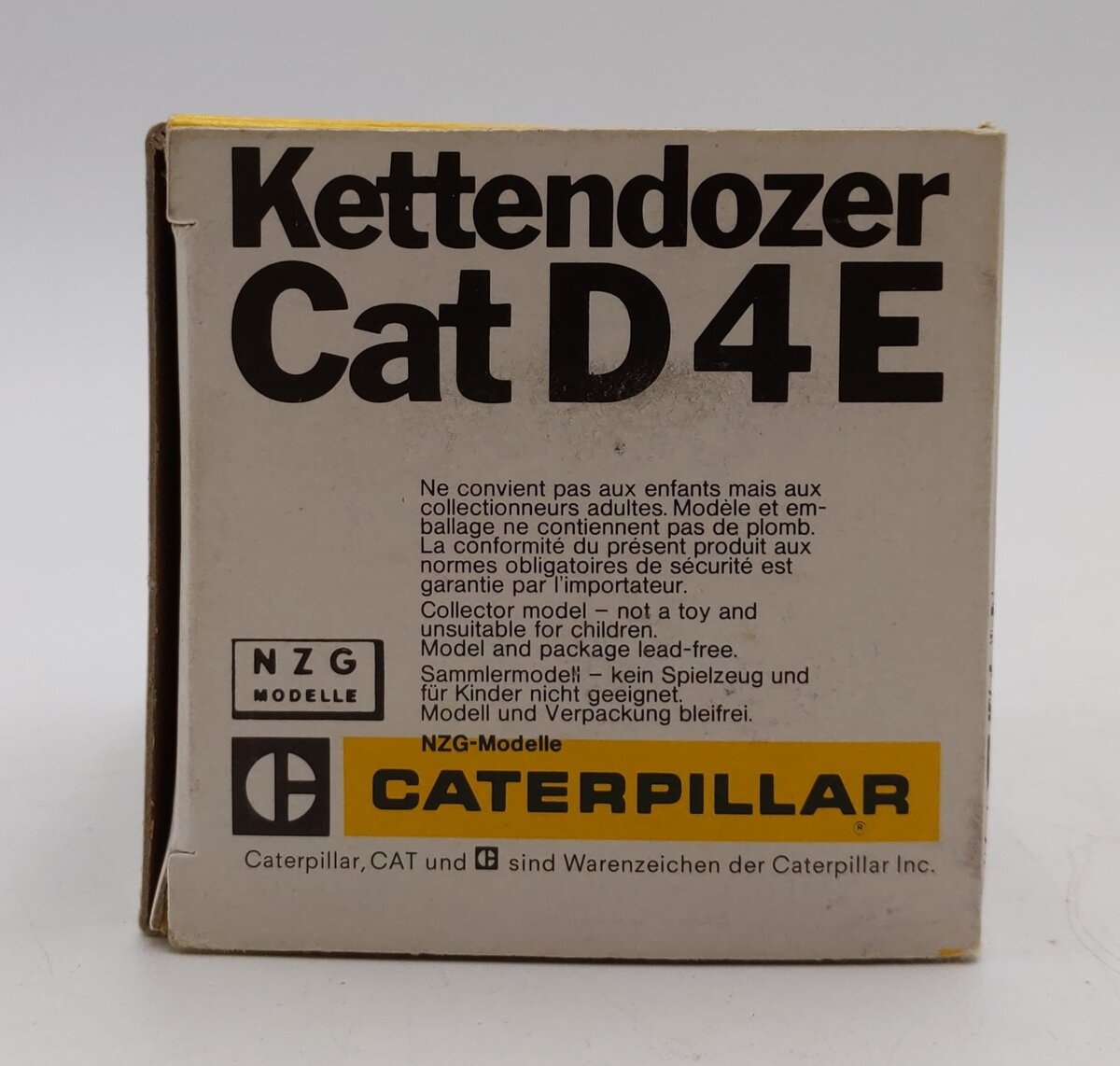 NZG Modelle 1:50 Scale Diecast Caterpillar CAT D4E Track-Type Tractor (Orange)/Box