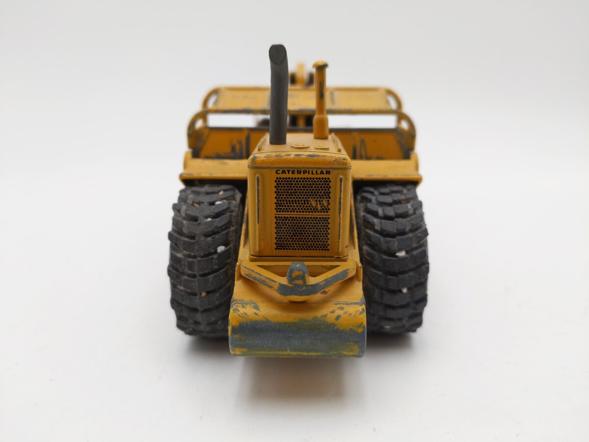 NZG 127 1:50 Scale Diecast Caterpillar 627 Push-Pull Scraper - Weathered EX
