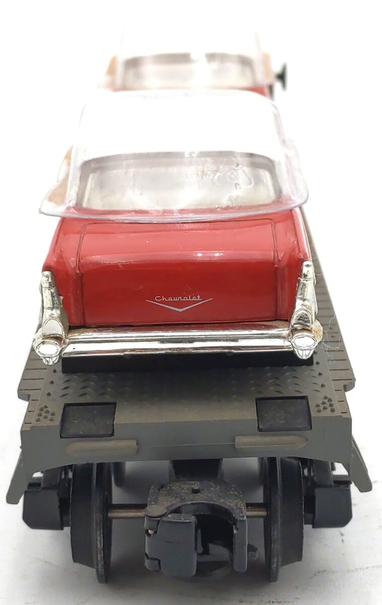 MTH 30-7610 O Gauge MTH Lines Flat Car with 2 Red Ertl '57 Chevys EX