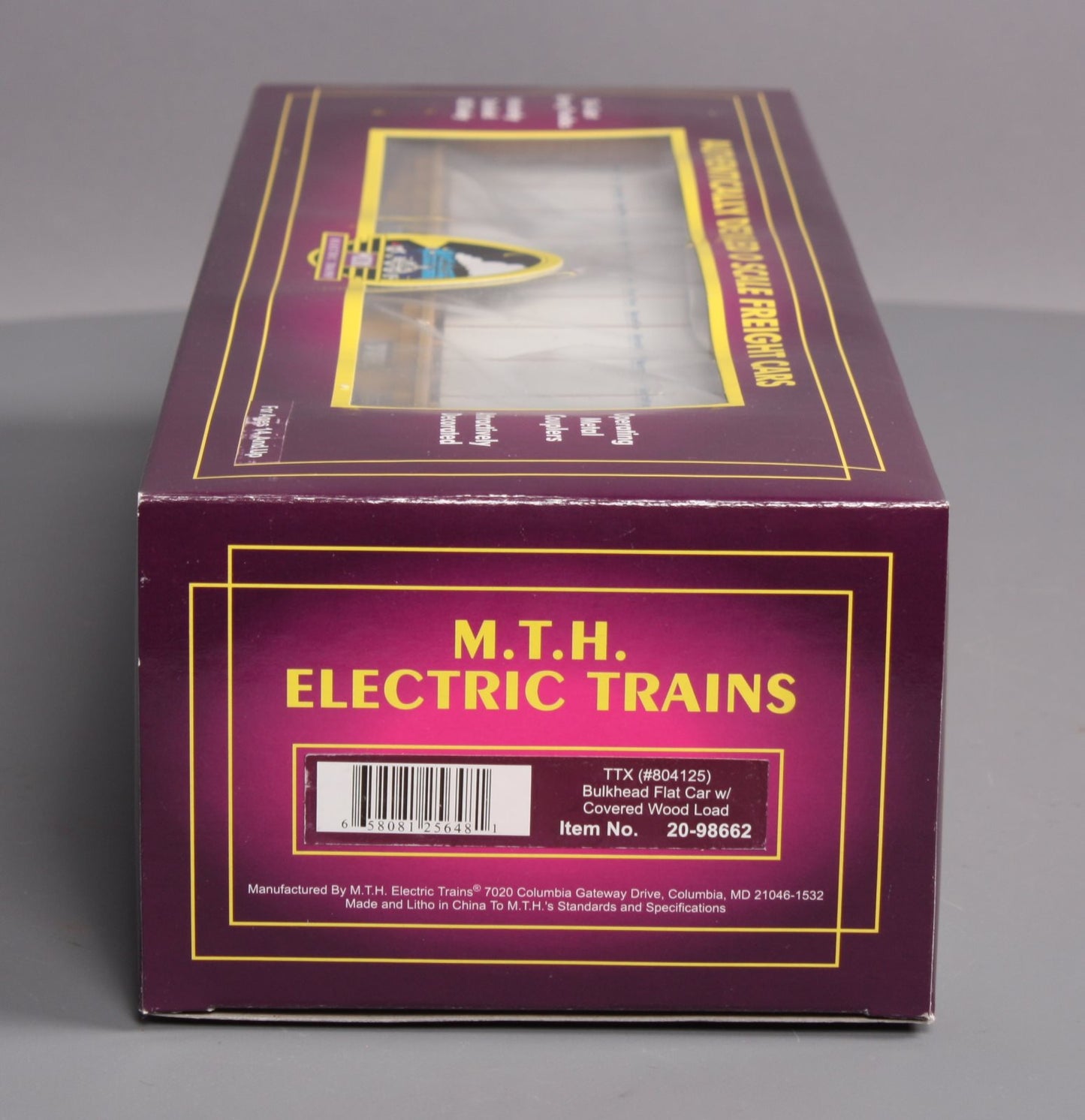 MTH 20-98662 TTX Flat Car w/Bulkheads w/Covered Wood Load V2