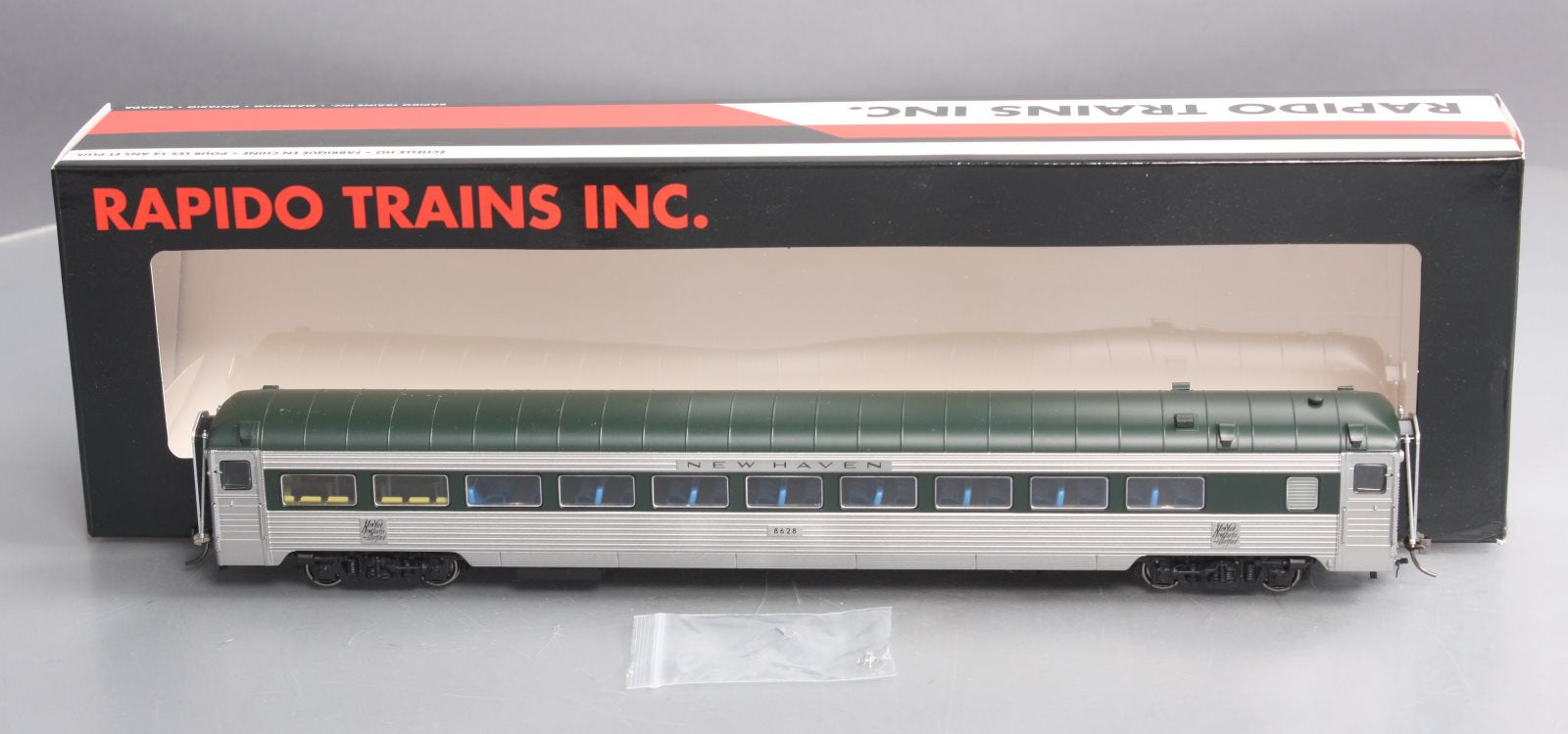 Rapido Trains 17203 HO New Haven 8600-Series Coach #8628 – Trainz