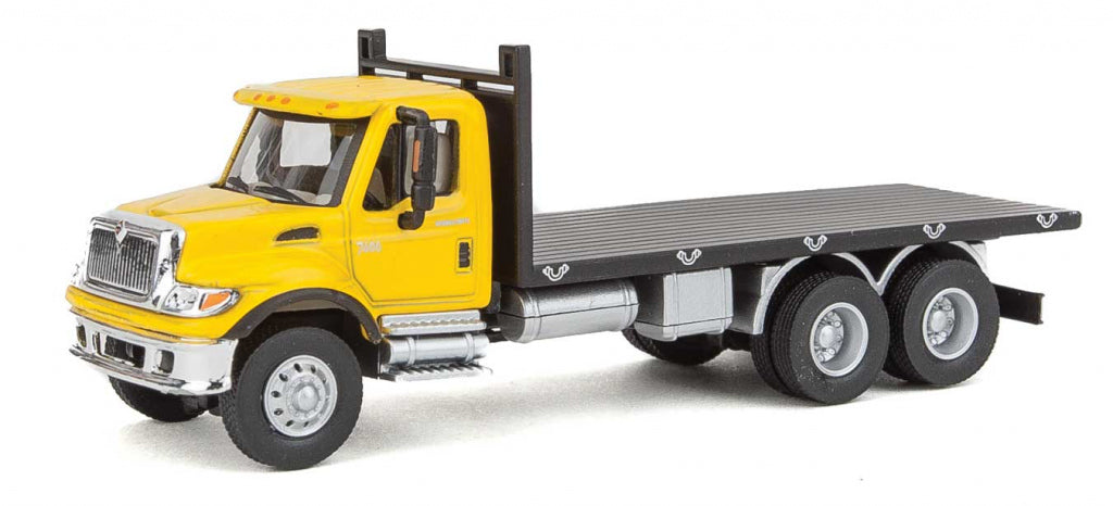 Walthers 949-11653 HO Assembled Yellow International 7600 3-Axle Flatbed Truck