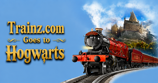 Trainz.com Goes to Hogwarts featuring a Harry Potter Hogwarts Express model train with Hogwarts Castle in the background