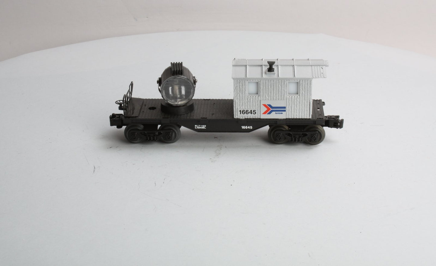 Lionel 6-16645 O Gauge Amtrak Operating Searchlight Caboose LN