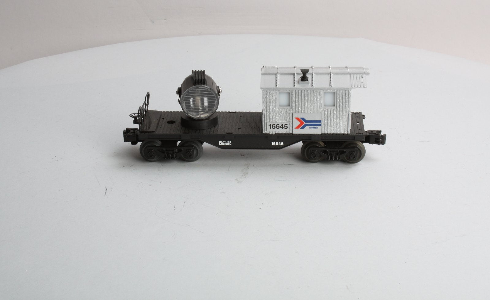 Lionel 6-16645 O Gauge Amtrak Operating Searchlight Caboose LN