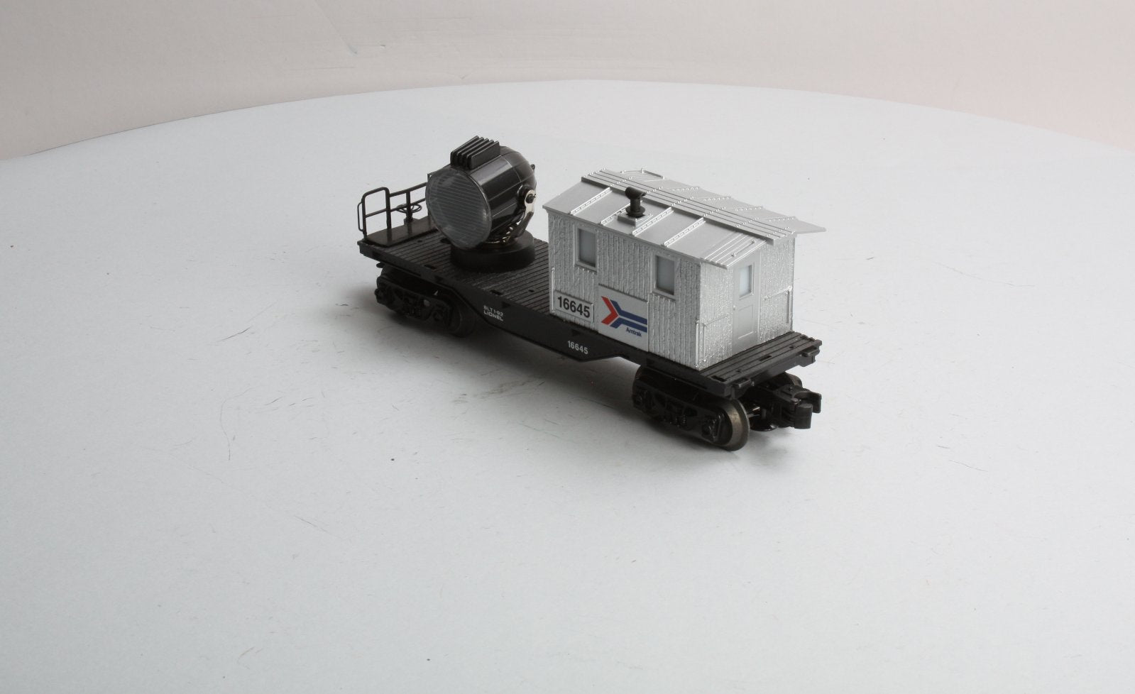 Lionel 6-16645 O Gauge Amtrak Operating Searchlight Caboose LN