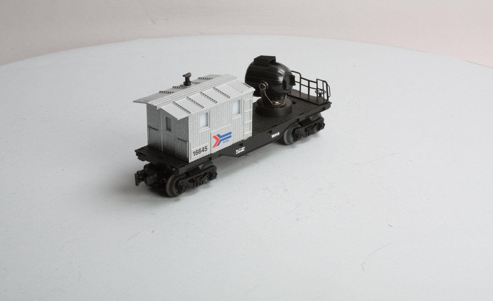Lionel 6-16645 O Gauge Amtrak Operating Searchlight Caboose LN
