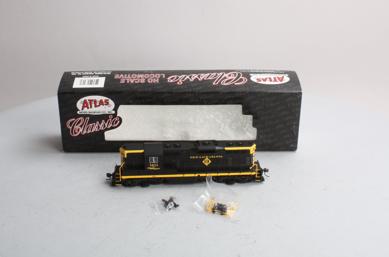 Atlas 8557 HO Erie Lackawanna EMD GP-7 Diesel Locomotive #1211 LN/Box