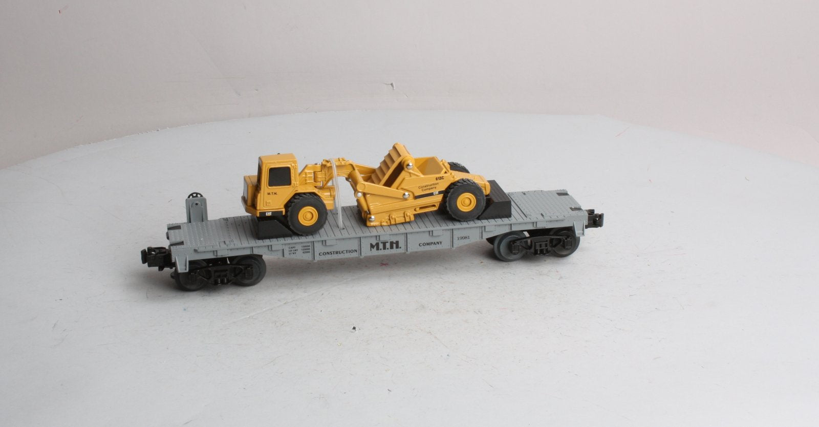 MTH 30-7616 O Gauge Construction Flatcar w/ Ertl Earth Mover #19981 LN/Box