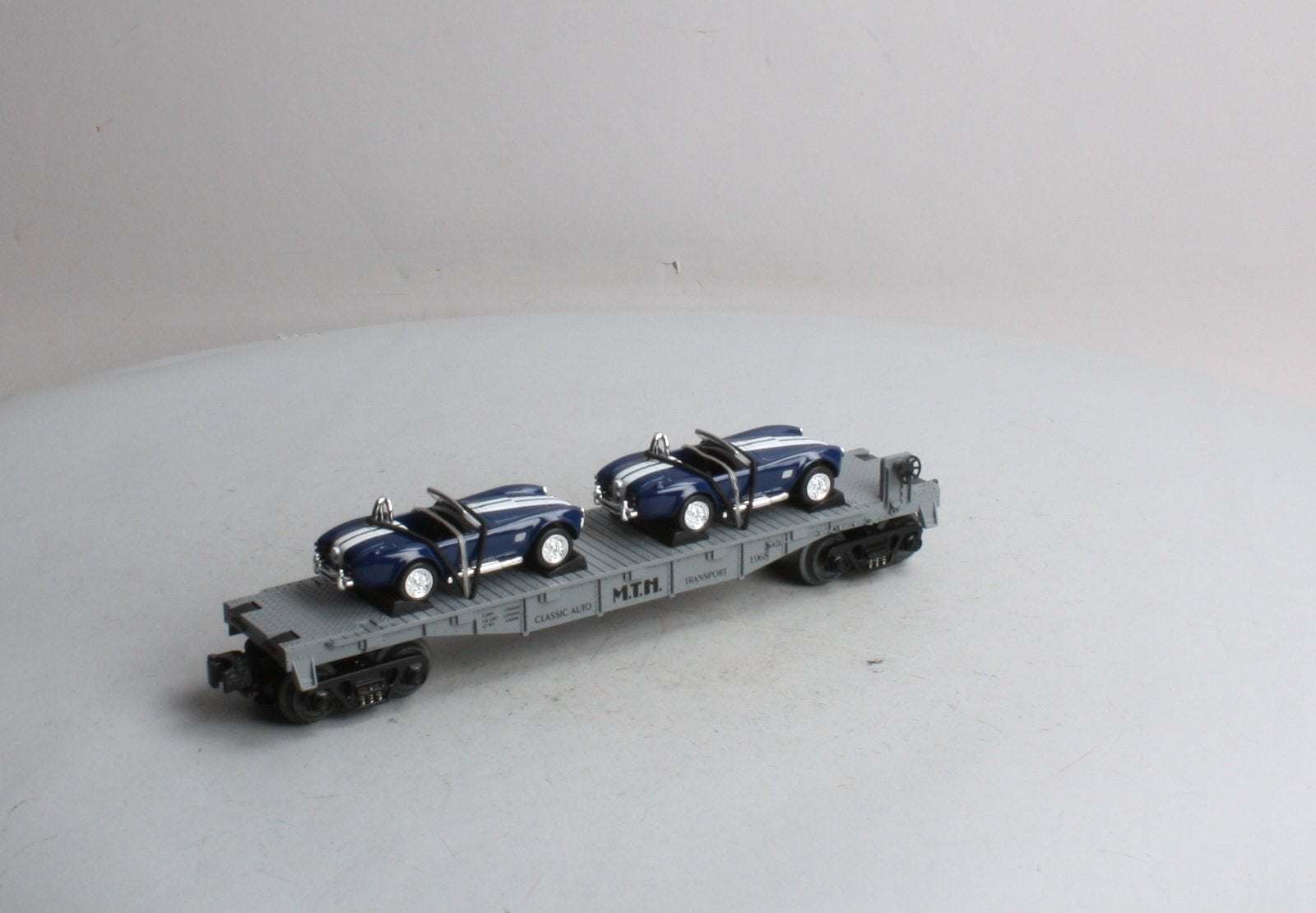 MTH 30-7660 O Gauge MTH Auto Transport Flatcar with Ertl '65 Shelby Cobra's NIB