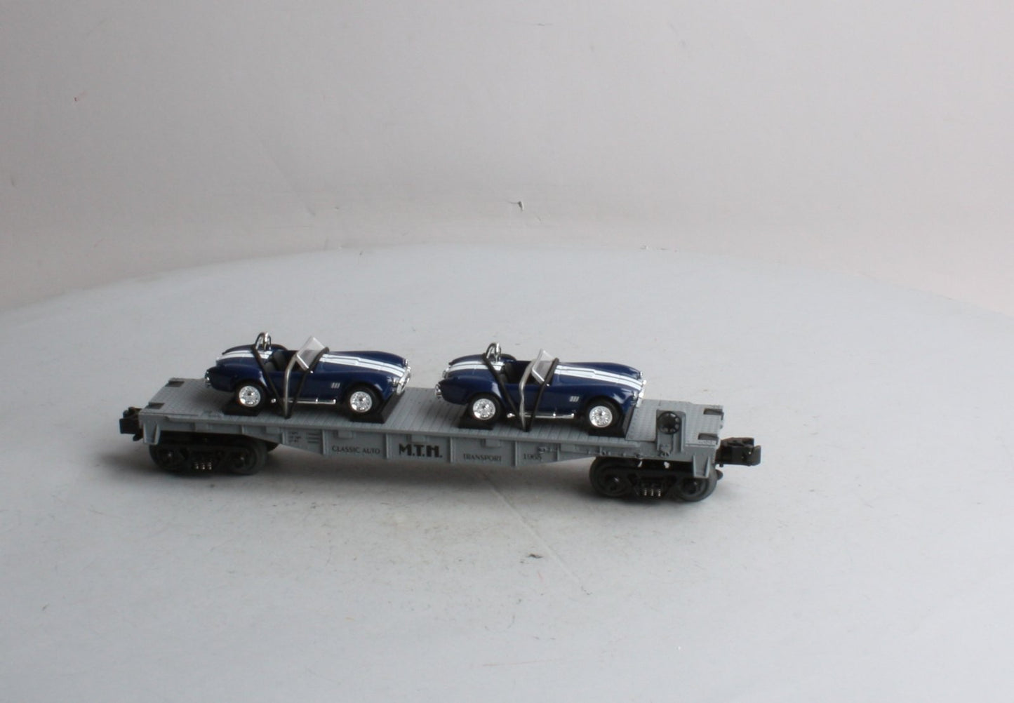 MTH 30-7660 O Gauge MTH Auto Transport Flatcar with Ertl '65 Shelby Cobra's NIB