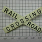 Lionel 154-34  Plastic Railroad Crossing Crossbuck with Black Lettering