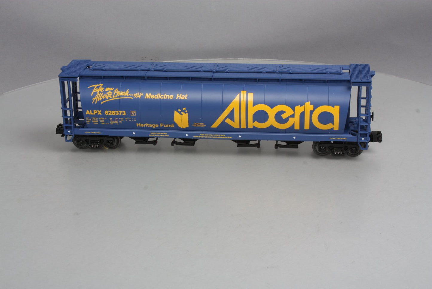 MTH 20-97444 O Alberta "Visit Medicine Hat" 4-Bay Hopper #628373 - 3 Rail LN/Box