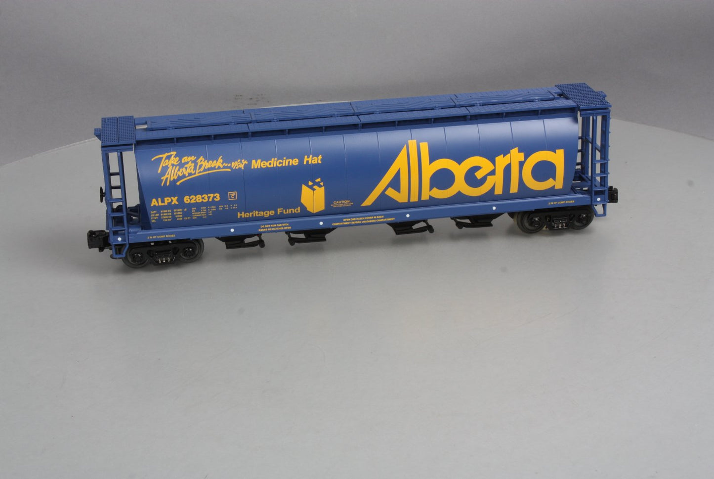 MTH 20-97444 O Alberta "Visit Medicine Hat" 4-Bay Hopper #628373 - 3 Rail LN/Box
