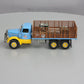 First Gear 19-3155 1:34 Mack L Series Stake Truck with Engine Load LN/Box