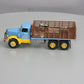 First Gear 19-3155 1:34 Mack L Series Stake Truck with Engine Load LN/Box