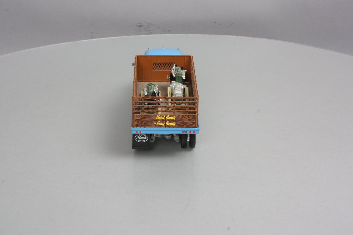 First Gear 19-3155 1:34 Mack L Series Stake Truck with Engine Load LN/Box