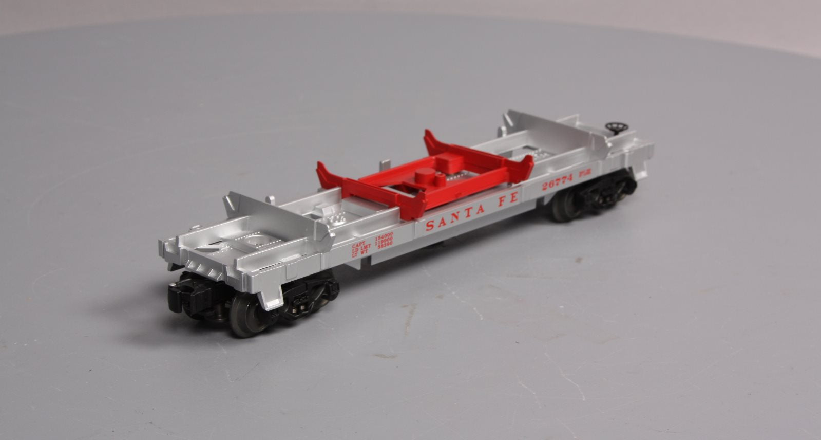 Lionel 6-26774 O Gauge Santa Fe Log Dump Car LN/Box