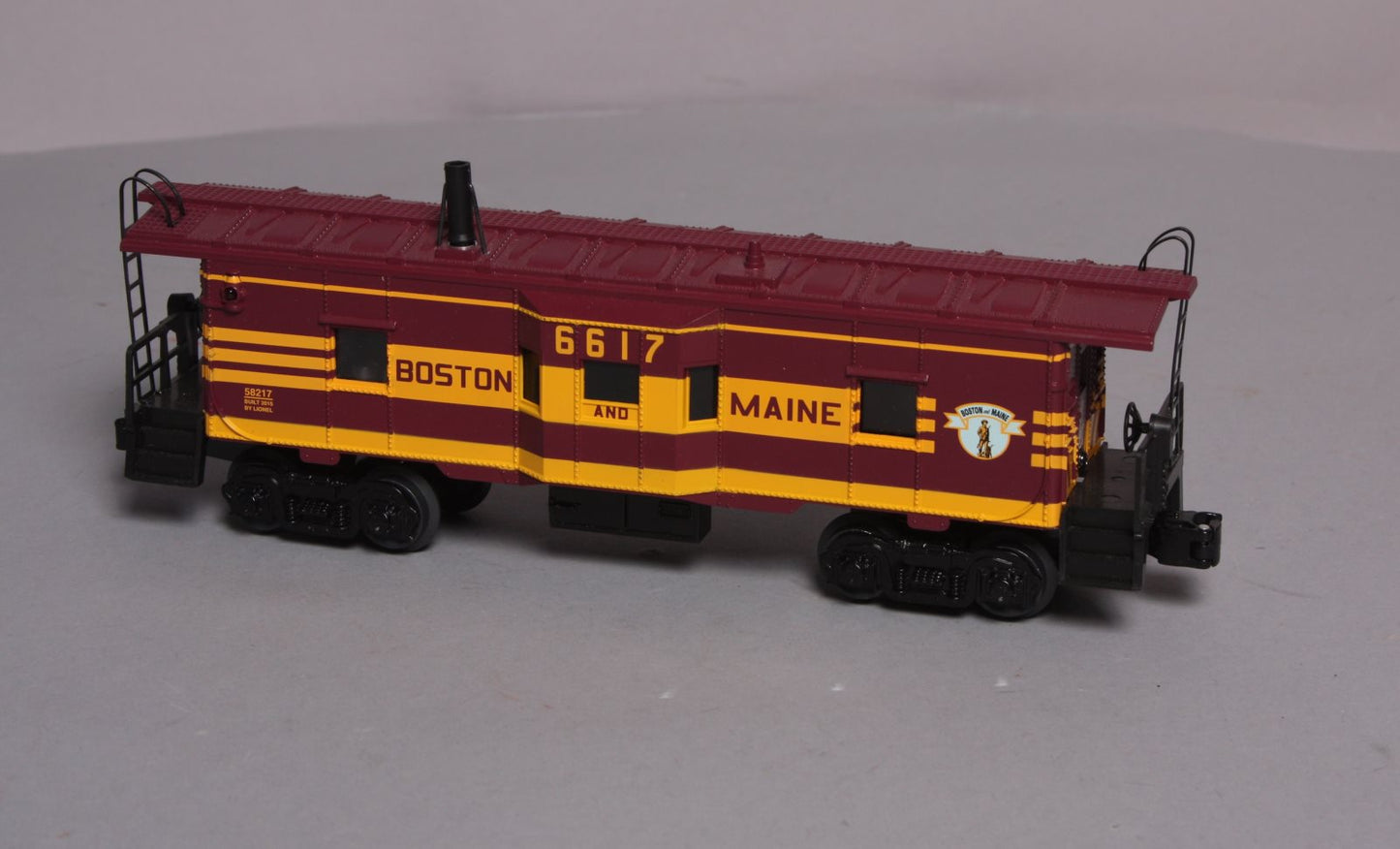 Lionel 6-58217 O Boston and Maine LLC Smoking Bay Window Caboose #6617 NIB