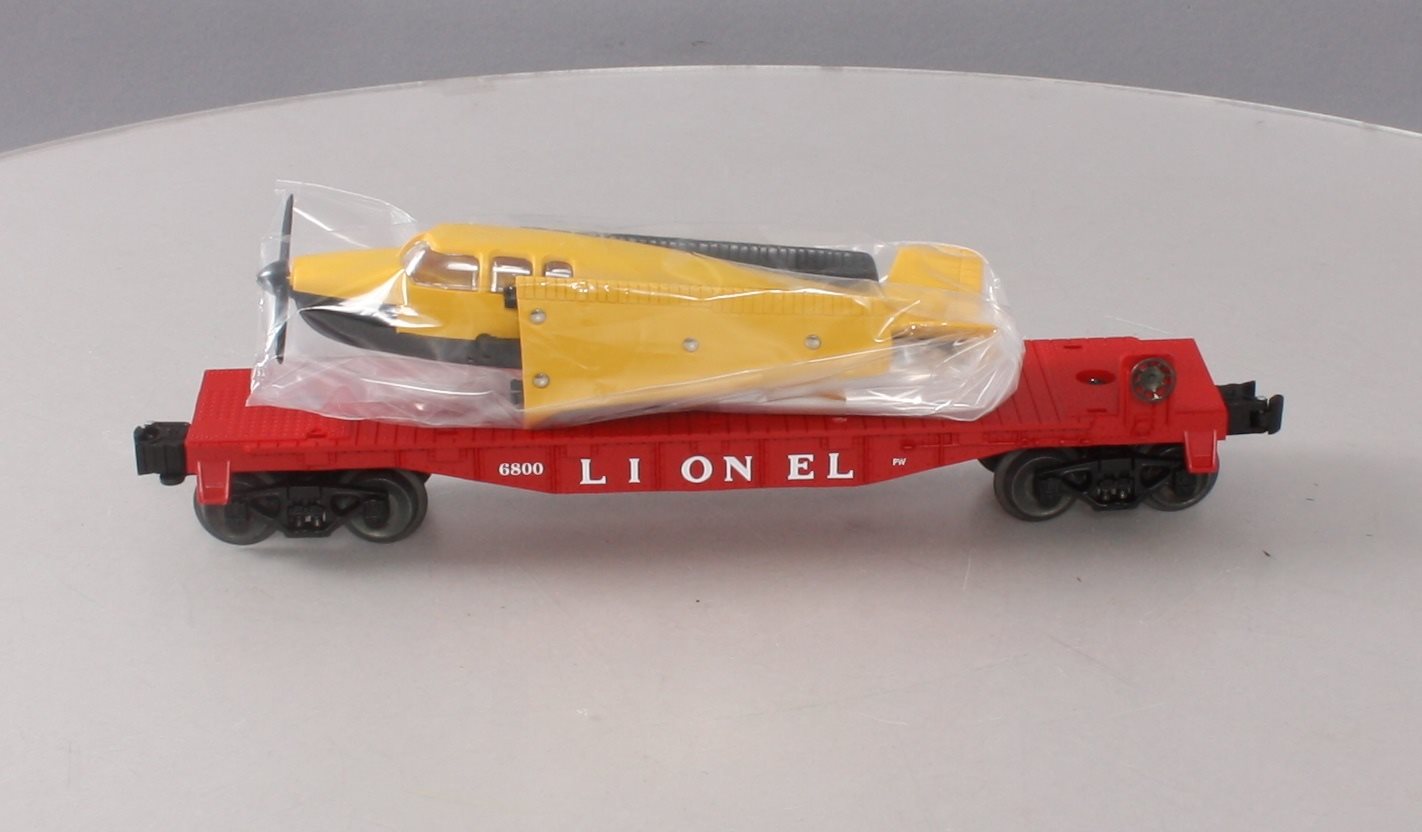 Lionel 6-19487 O Gauge PWC Flatcar w/ Yellow & Black Airplane LN/Box