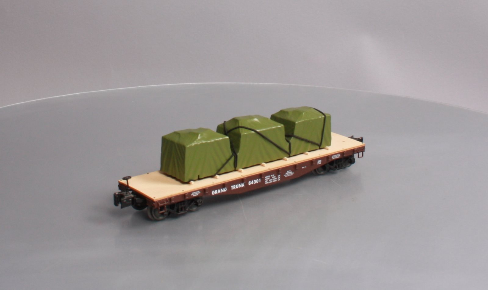 Lionel 6-27544 O Gauge Grand Trunk 40 Flatcar w/ Covered Load #64301