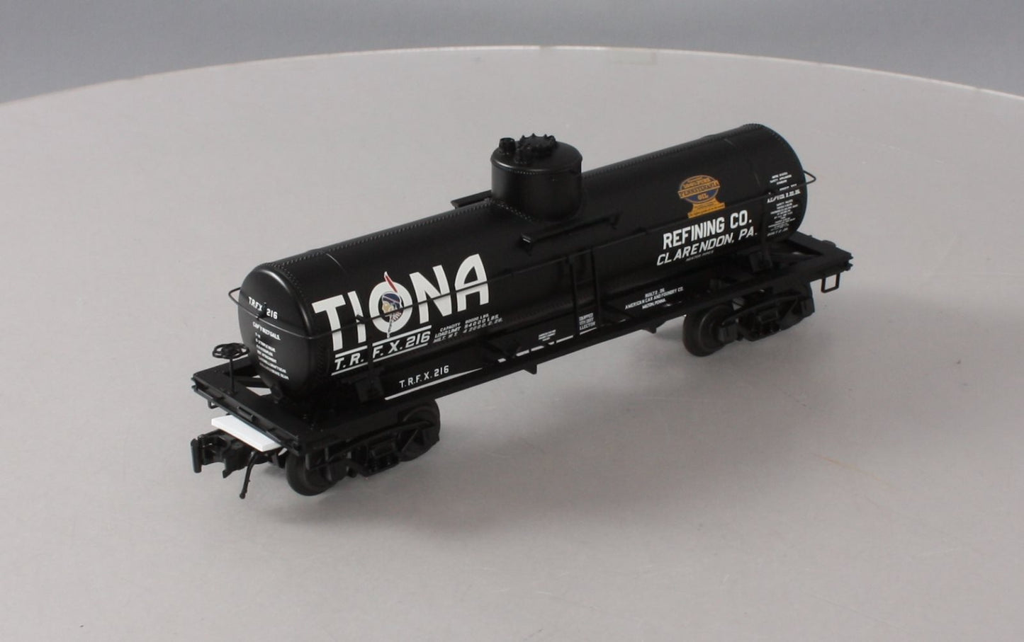Atlas 3003828-1 O Gauge Tiona Refining Co. 8,000 Gallon Tank Car #216 (3-Rail) LN/Box