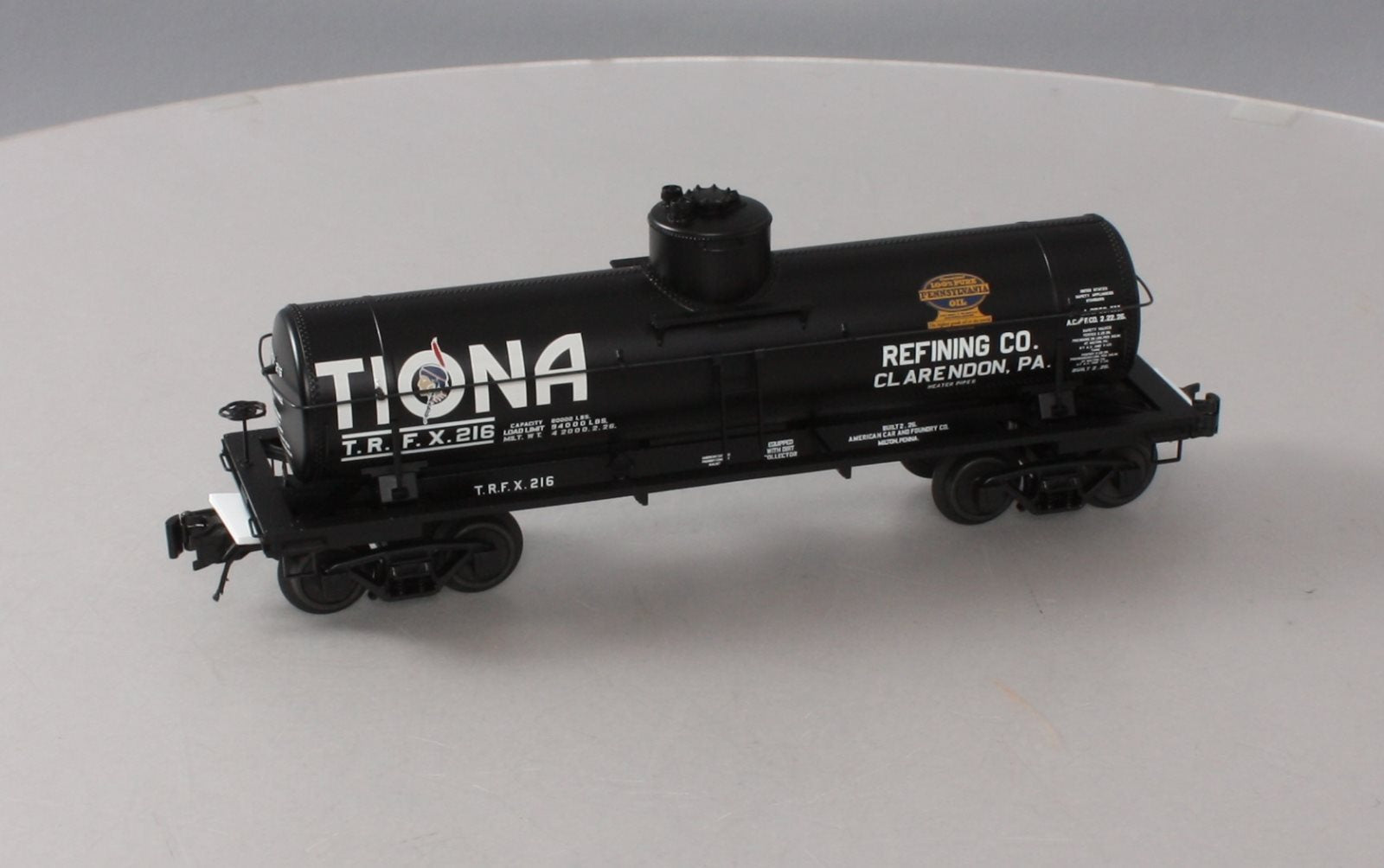 Atlas 3003828-1 O Gauge Tiona Refining Co. 8,000 Gallon Tank Car #216 (3-Rail) LN/Box