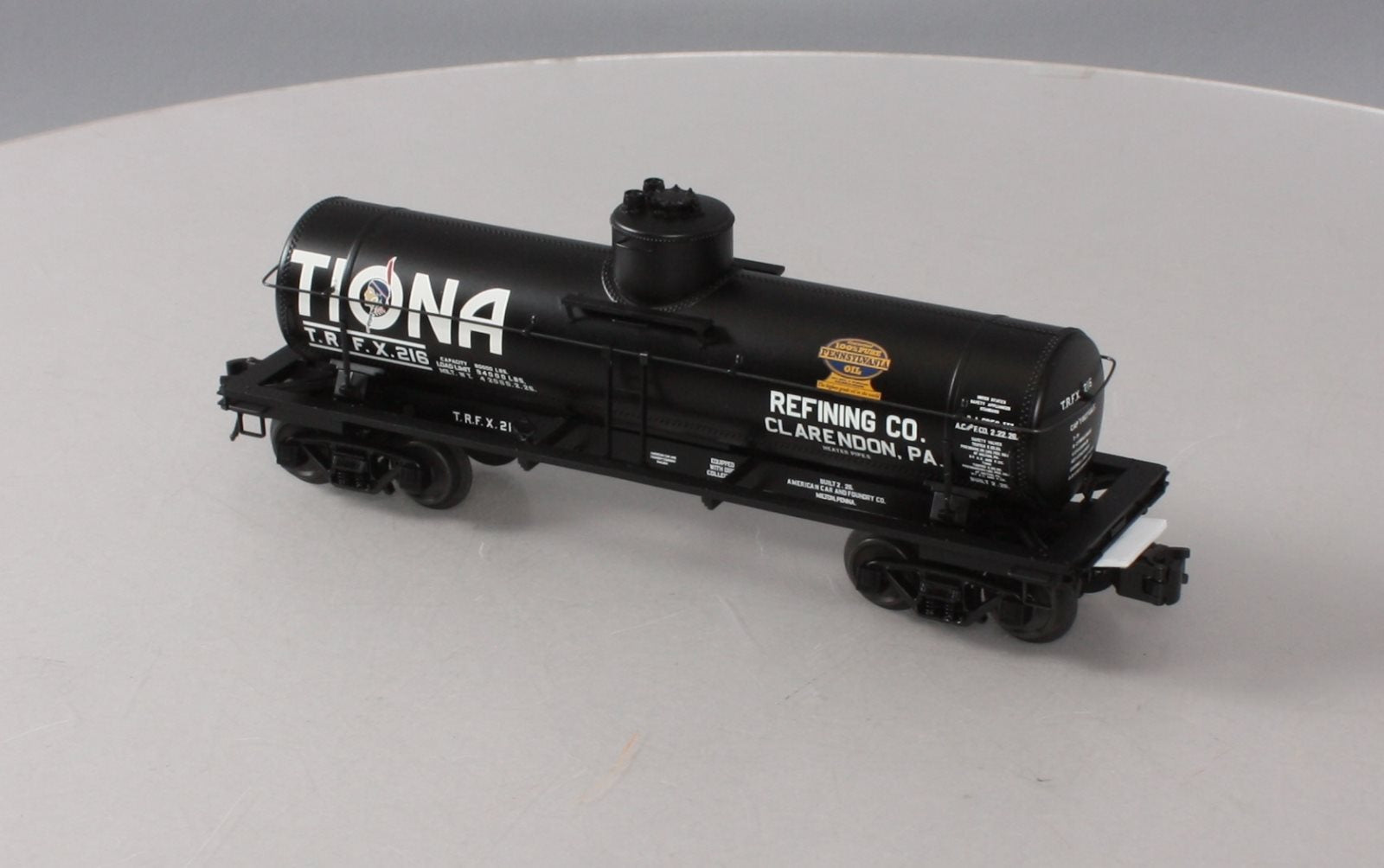 Atlas 3003828-1 O Gauge Tiona Refining Co. 8,000 Gallon Tank Car #216 (3-Rail) LN/Box