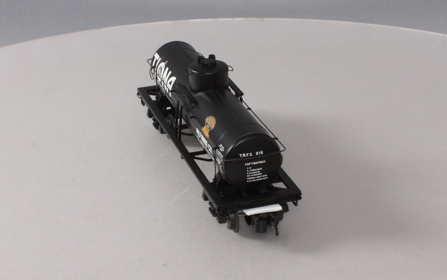 Atlas 3003828-1 O Gauge Tiona Refining Co. 8,000 Gallon Tank Car #216 (3-Rail) LN/Box