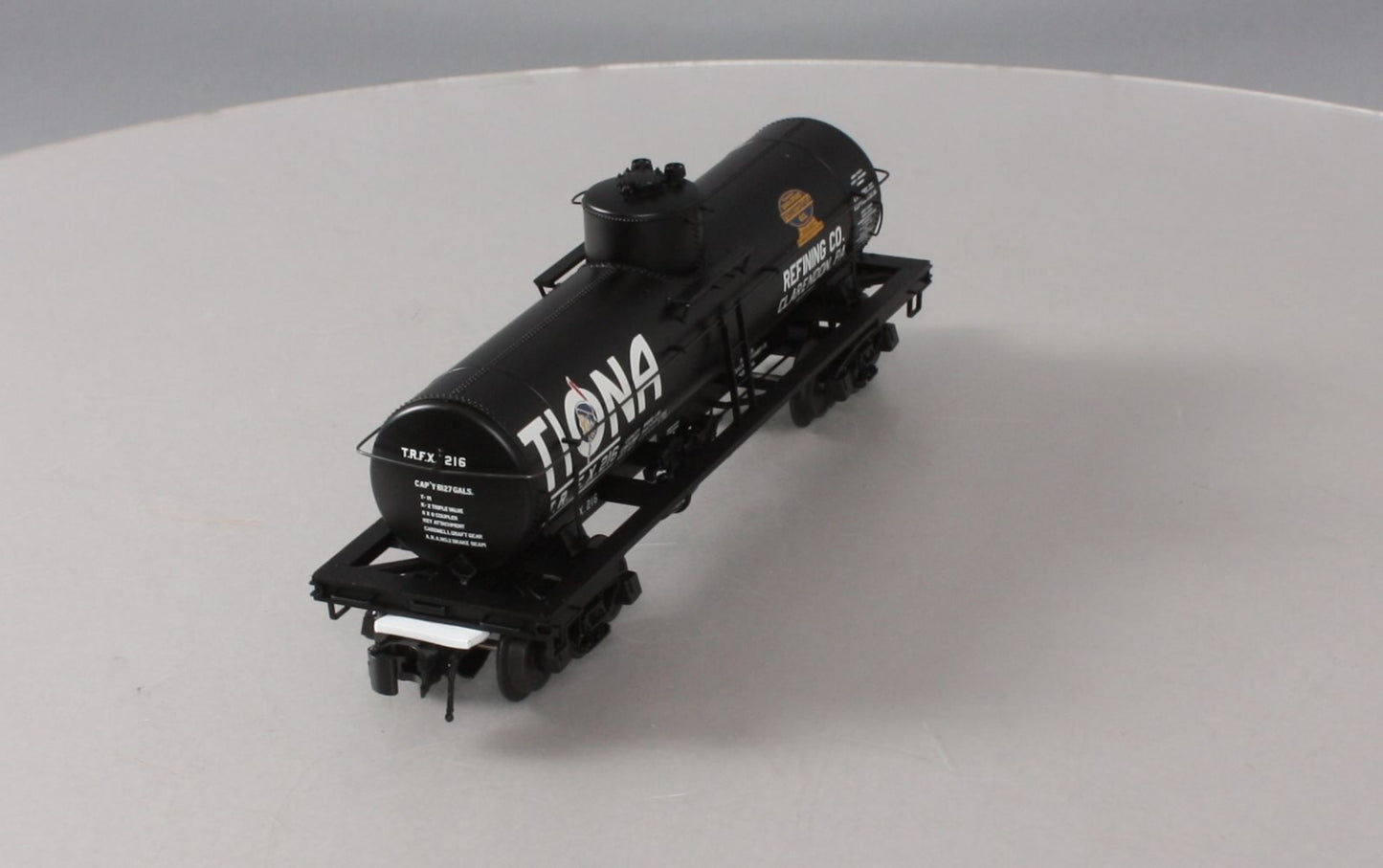 Atlas 3003828-1 O Gauge Tiona Refining Co. 8,000 Gallon Tank Car #216 (3-Rail) LN/Box