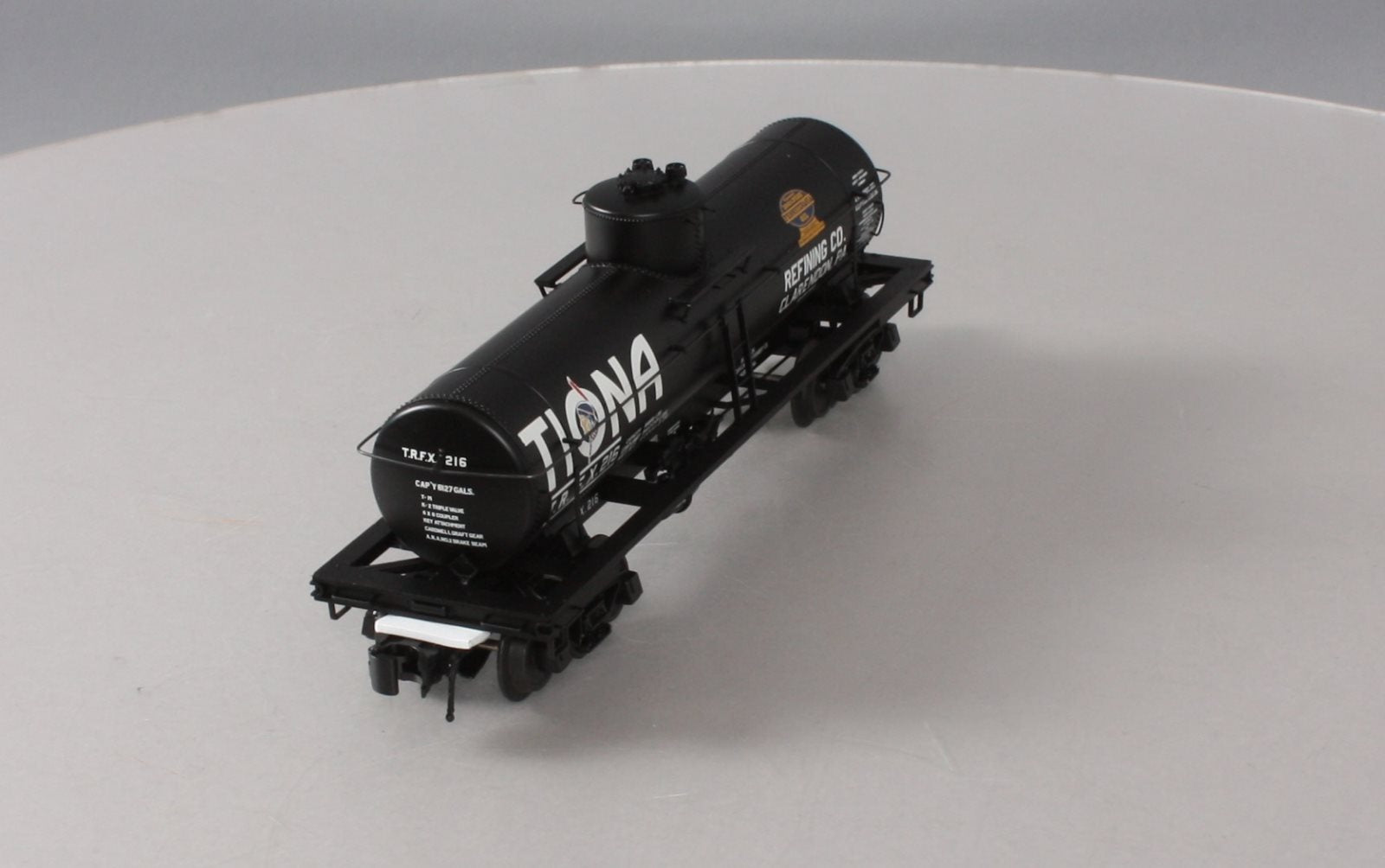 Atlas 3003828-1 O Gauge Tiona Refining Co. 8,000 Gallon Tank Car #216 (3-Rail) LN/Box