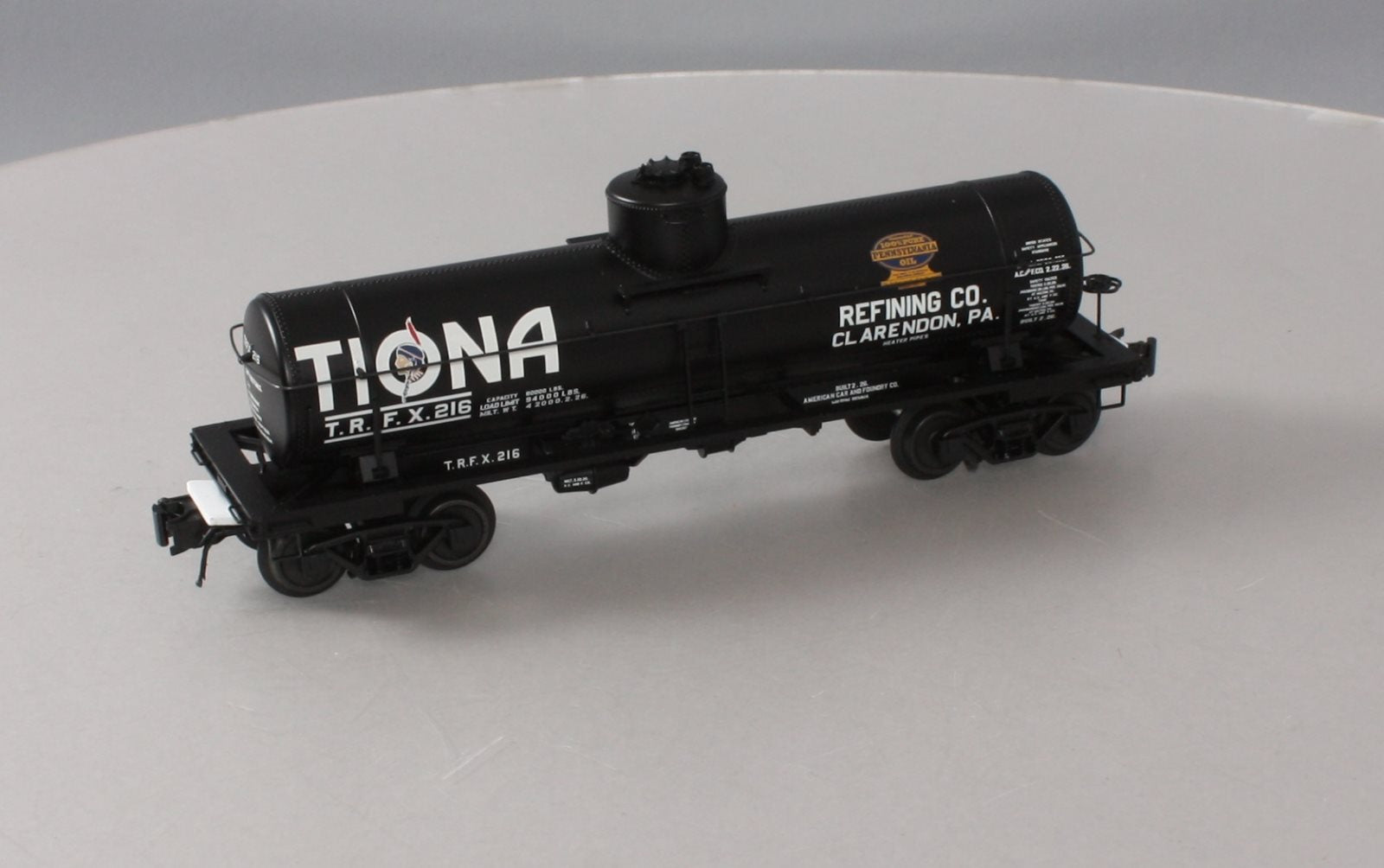 Atlas 3003828-1 O Gauge Tiona Refining Co. 8,000 Gallon Tank Car #216 (3-Rail) LN/Box