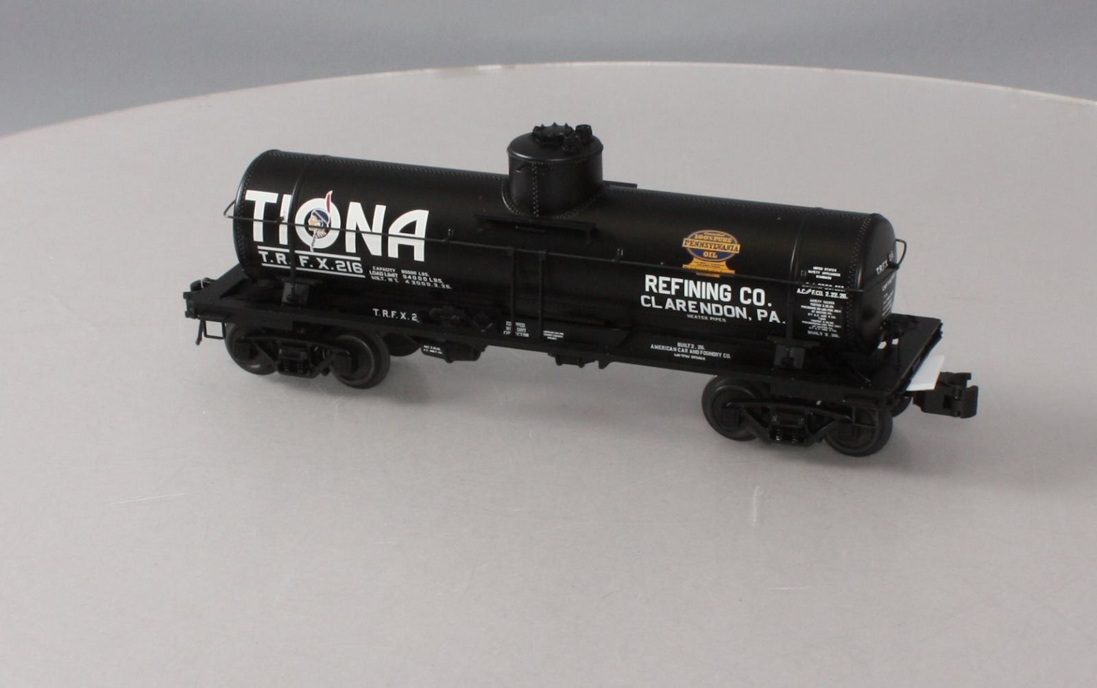 Atlas 3003828-1 O Gauge Tiona Refining Co. 8,000 Gallon Tank Car #216 (3-Rail) LN/Box