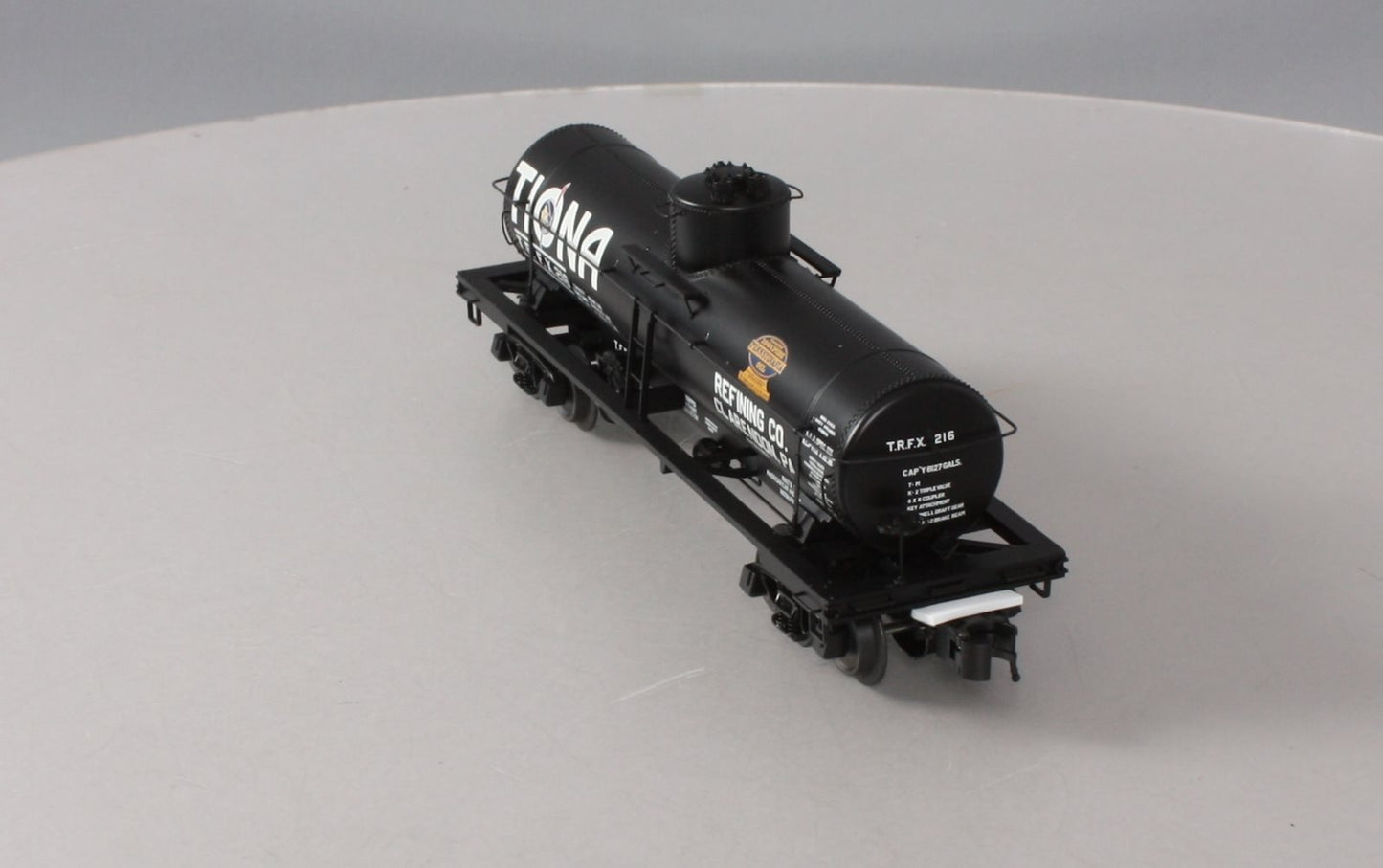 Atlas 3003828-1 O Gauge Tiona Refining Co. 8,000 Gallon Tank Car #216 (3-Rail) LN/Box