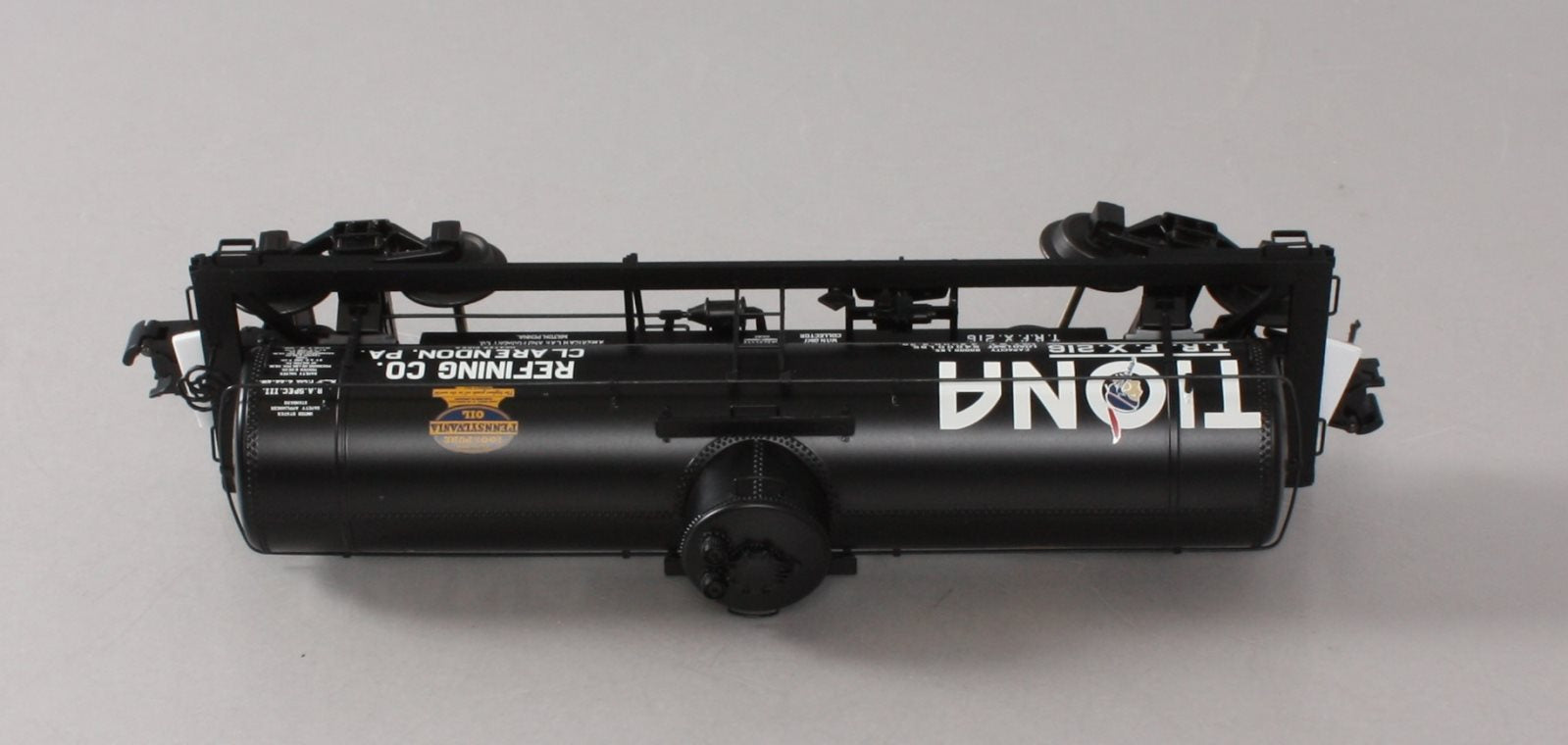 Atlas 3003828-1 O Gauge Tiona Refining Co. 8,000 Gallon Tank Car #216 (3-Rail) LN/Box