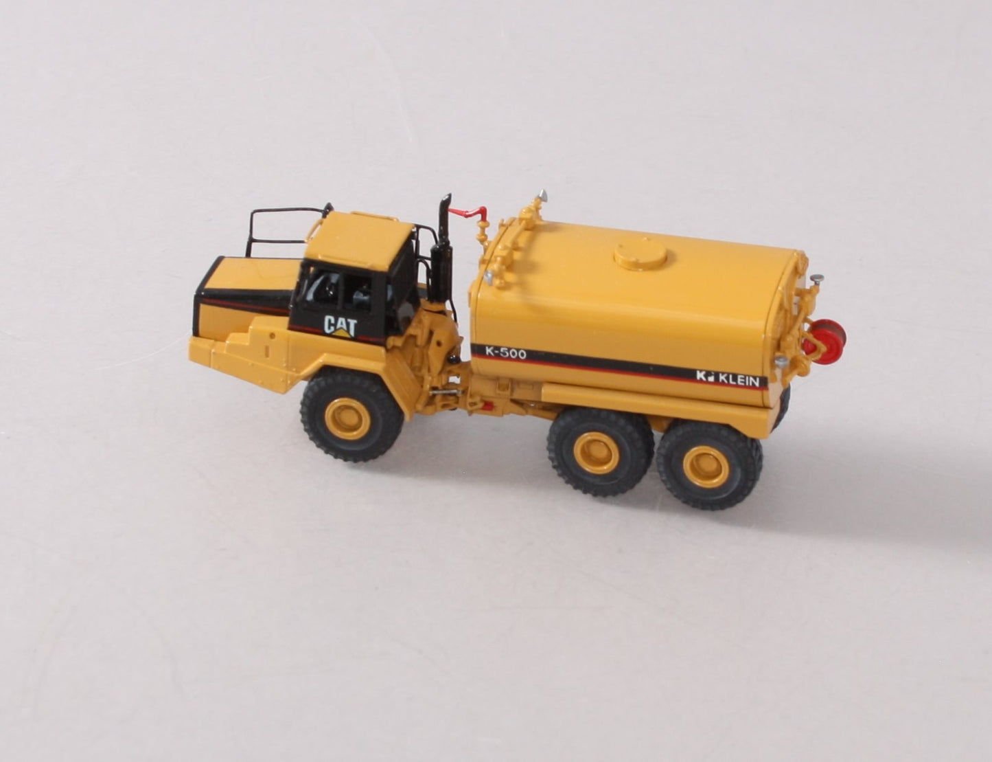 CCM BRASS 1:87 CAT D250E II Articulated Truck NIB