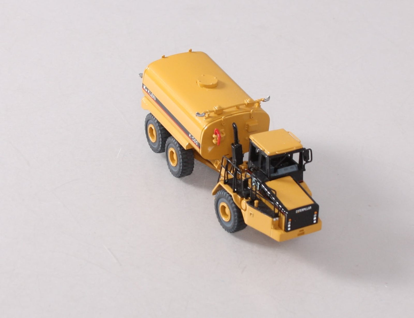 CCM BRASS 1:87 Scale Diecast CAT D250E II Articulated Truck LN/Box