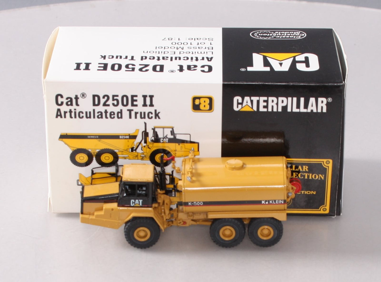 CCM BRASS 1:87 Scale Diecast CAT D250E II Articulated Truck LN/Box