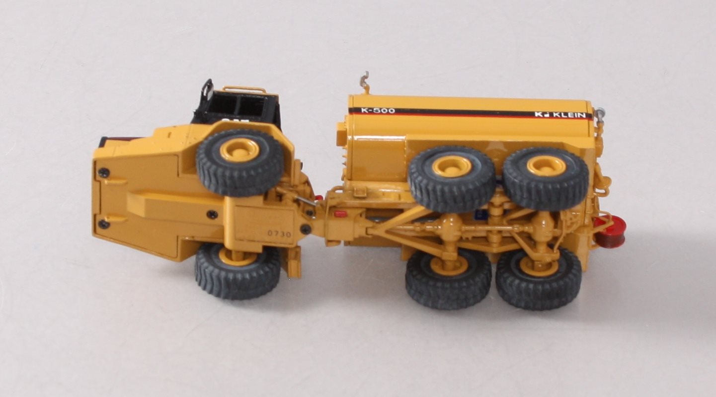 CCM BRASS 1:87 Scale Diecast CAT D250E II Articulated Truck LN/Box