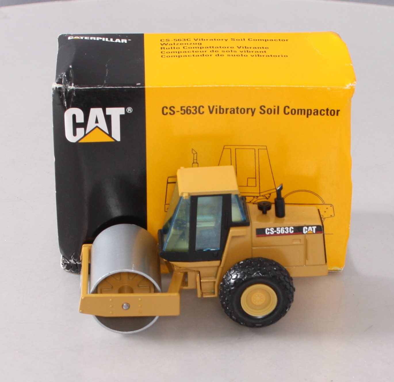 NZG 4011 1:50 Caterpillar CS-563C Vibratory Soil Compactor