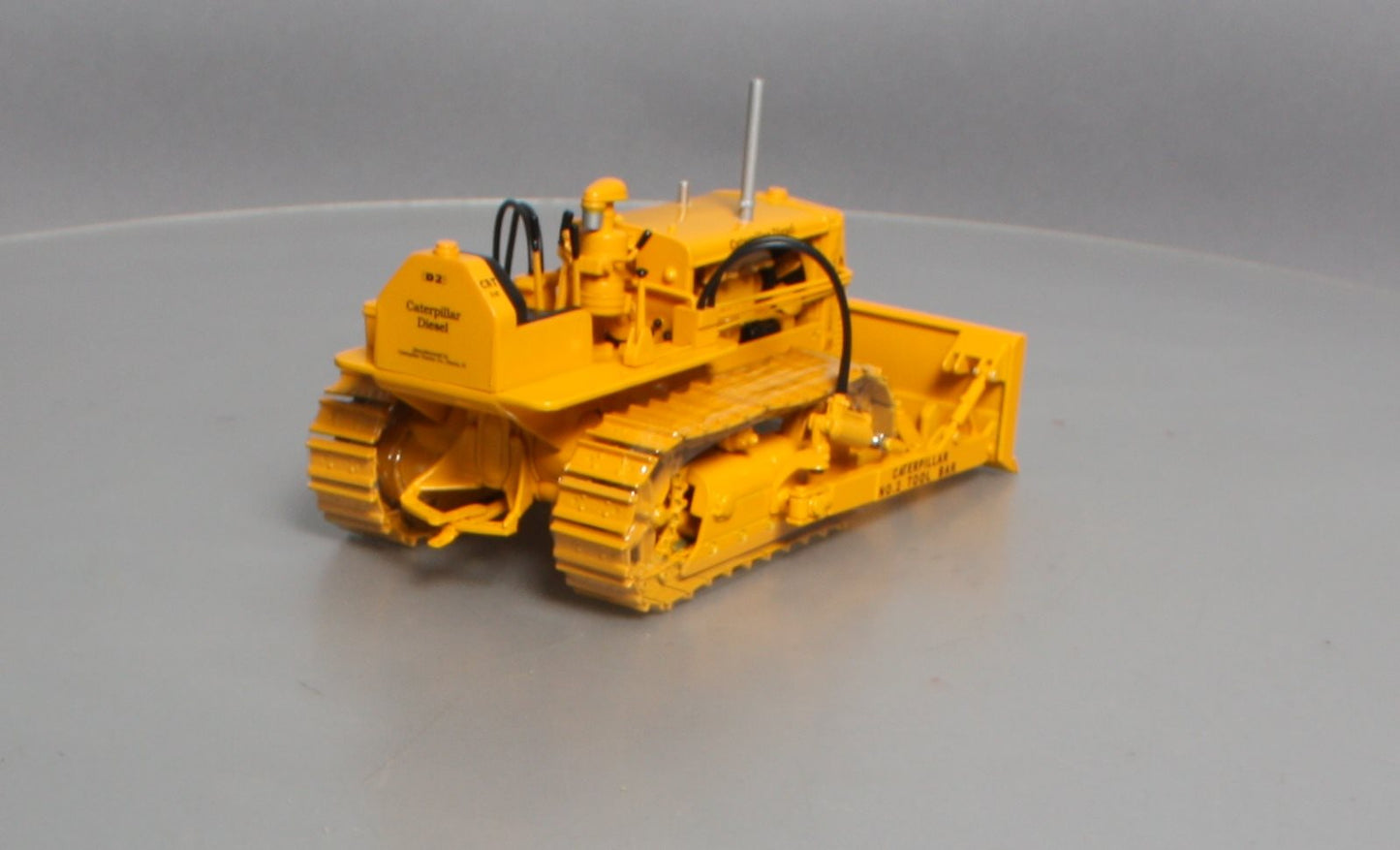 Spec Cast 782 1:16 Caterpillar D2 Track-Type Trailer W/ Tool Bar Blade LN/Box