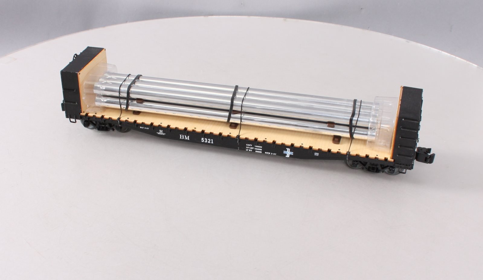 Lionel 6-27837 O Boston & Maine Bulkhead Flatcar w/Pipe Load #5321