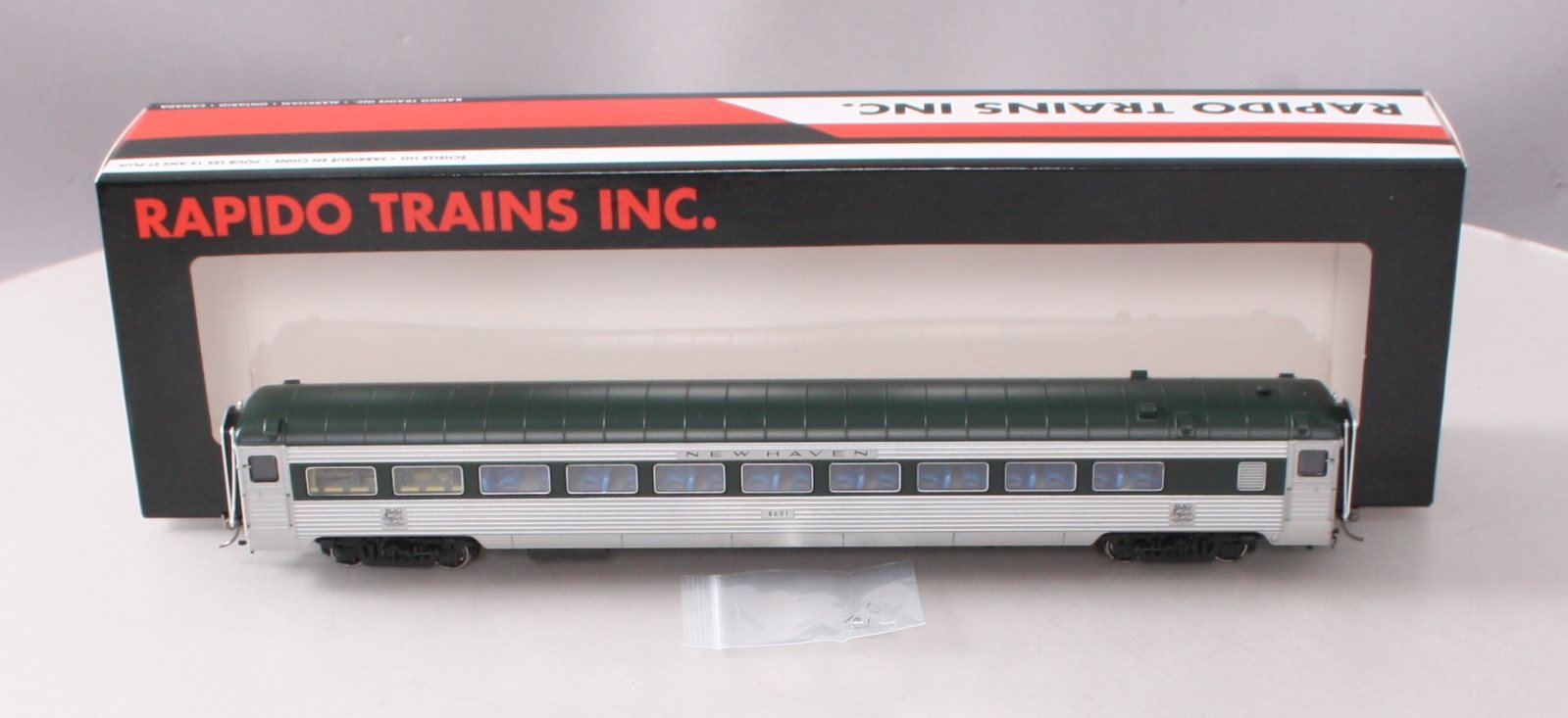 Rapido Trains 017200 HO New Haven Delivery 8600 Coach Skirted #8601